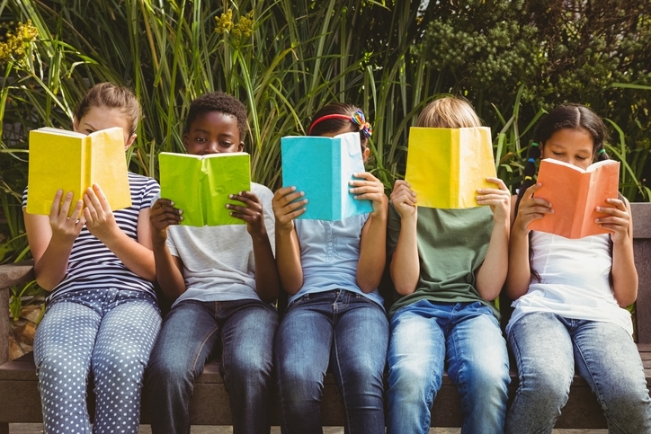 group of children reading books.jpg